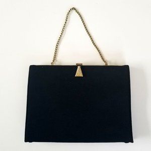 Vintage black purse with unique closure
